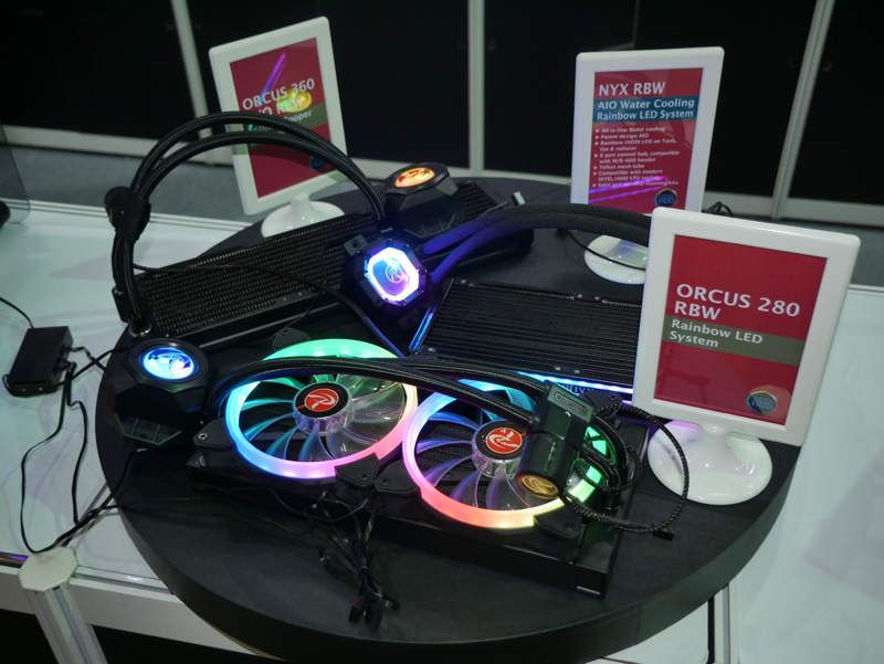 The new liquid Raijintek Nyx RBW, Orcus RBW and the radiator Calore C360D are shown
